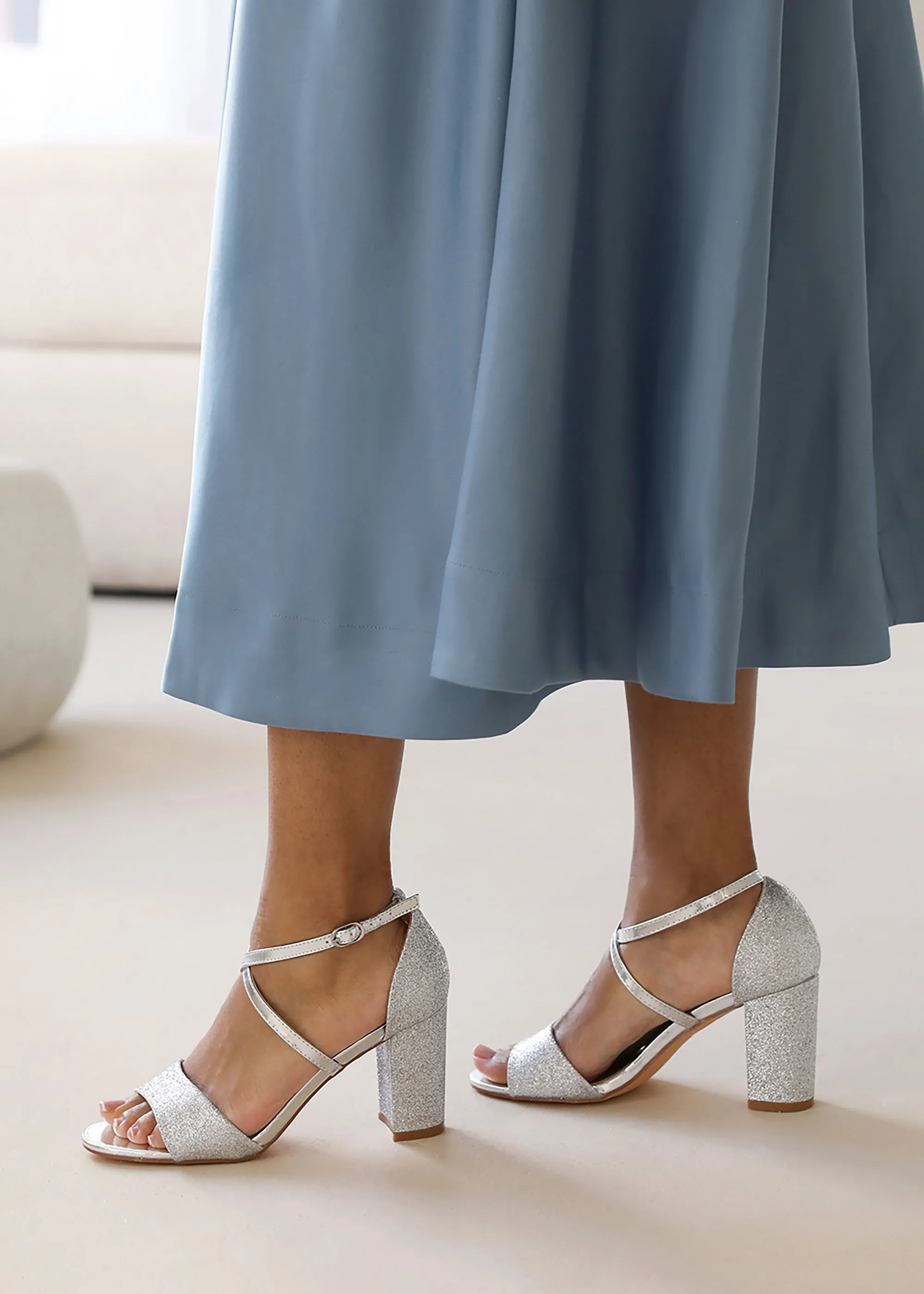 RUTH WIDE FIT HIGH BLOCK HEEL SANDALS WITH CROSS OVER ANKLE STRAP IN SILVER GLITTER